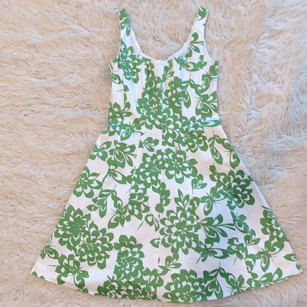 Green and white garden party dress
